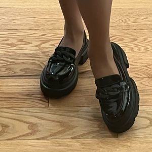 Womens Loafer with black plastic accessory